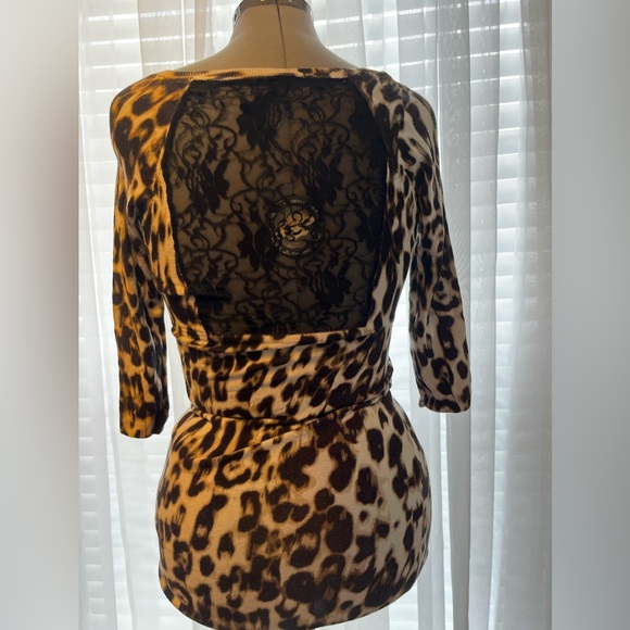 Guess cheetah print stretchy dress with black lace in the back. - Picture 7 of 13